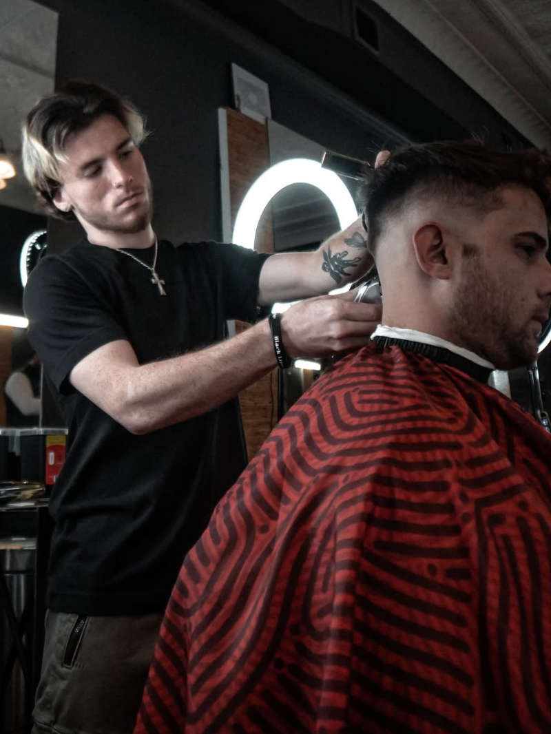 barber-clippers-profile Barber using clippers